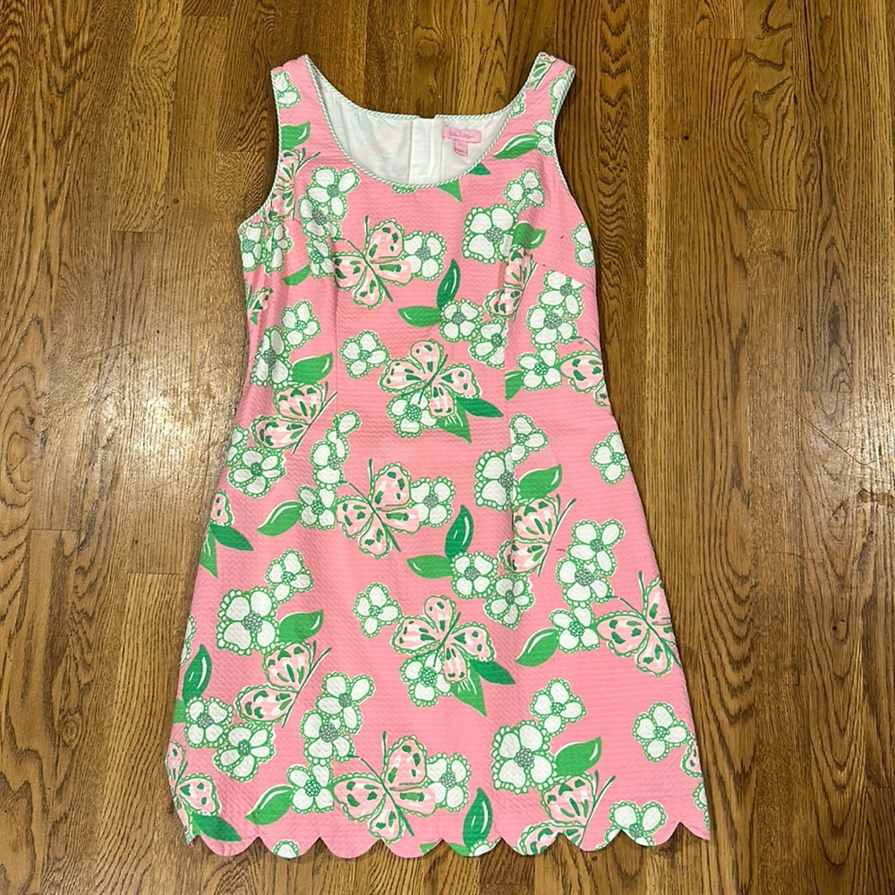 Lilly Pulitzer,great dress,womens’s 12,runs small.Scalloped hem;back bow ties!